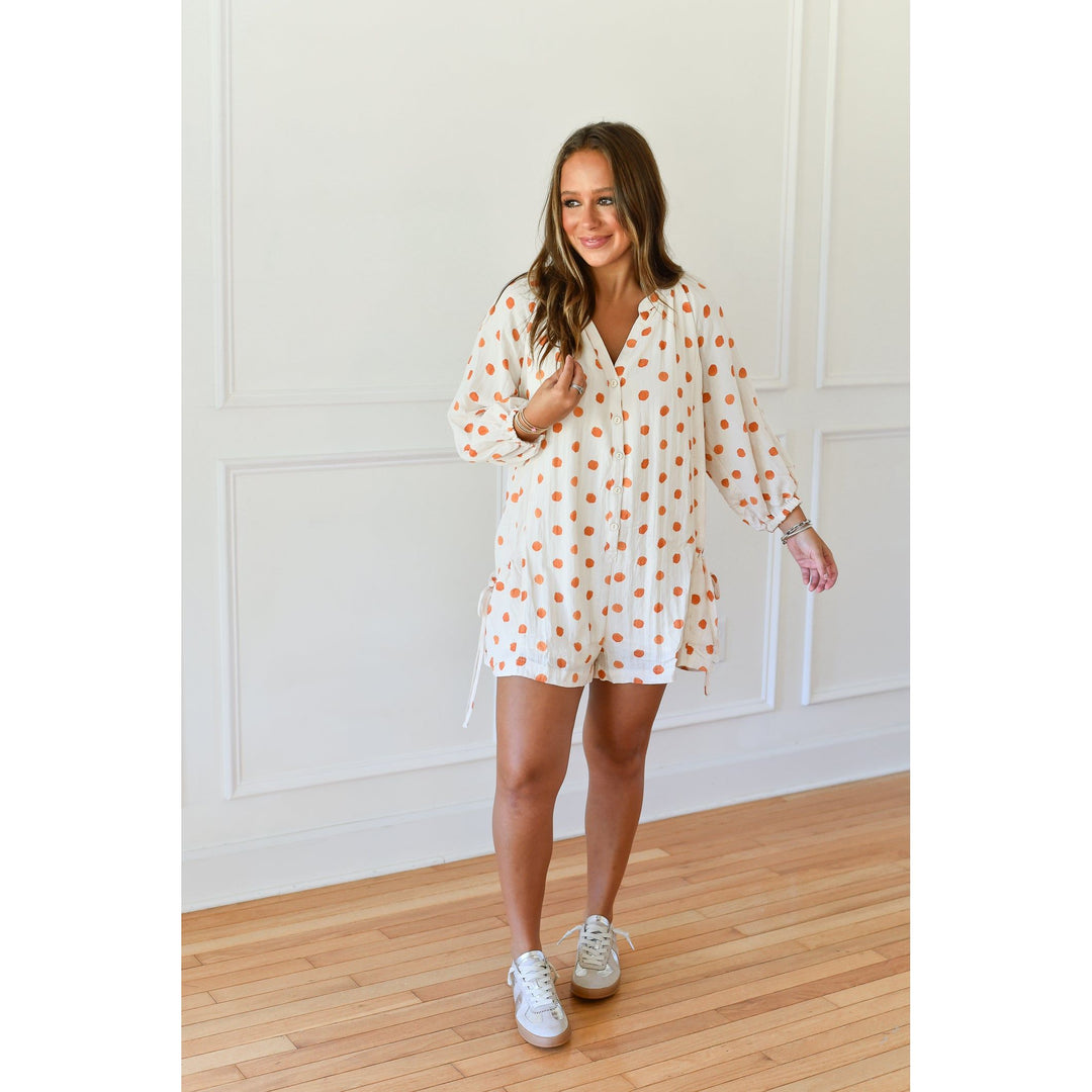 orange polka dot romper