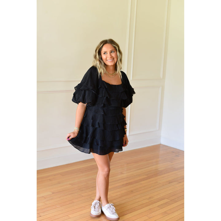 black ruffle dress