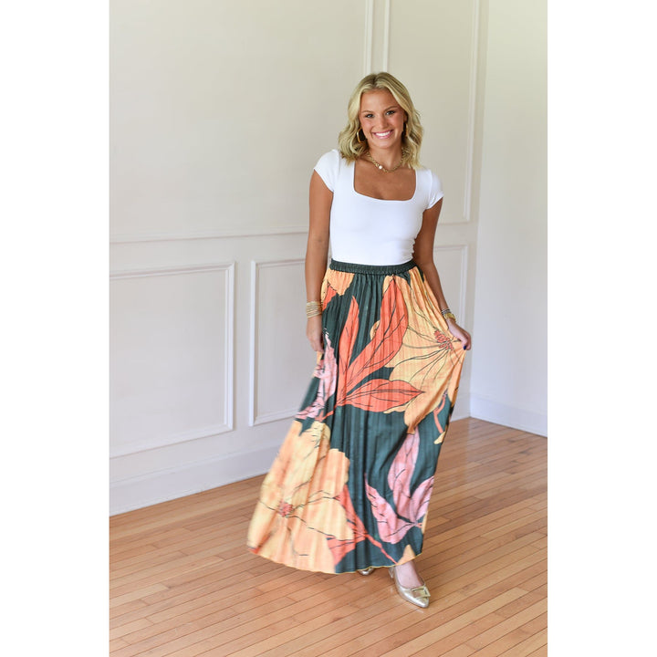 green floral print maxi skirt with pleats