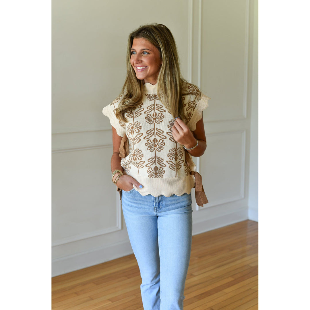 cream sweater with tan tie sides