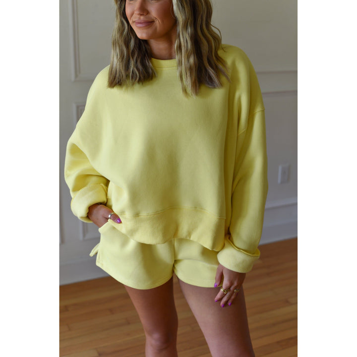 yellow sweatshirt