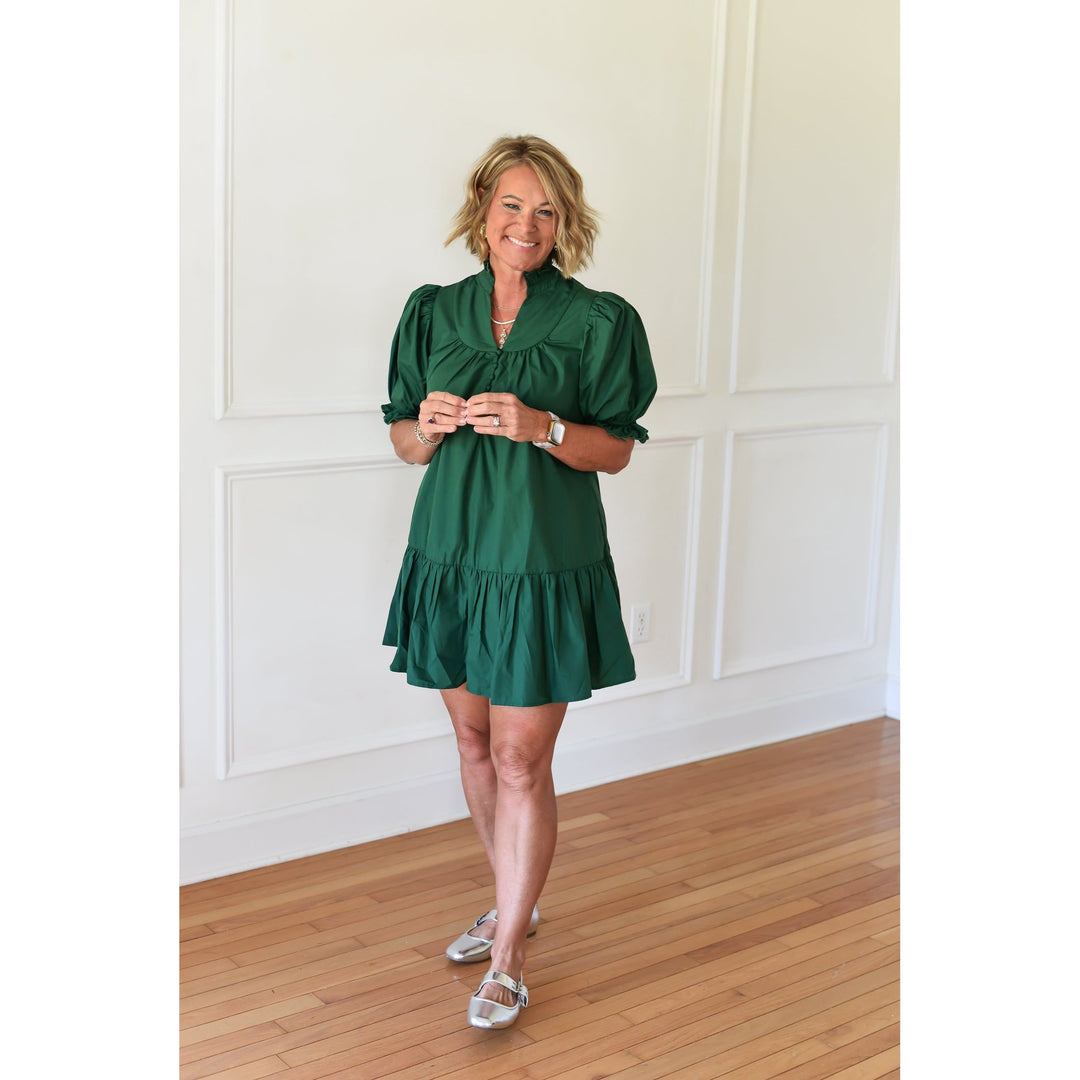 green knee length dress